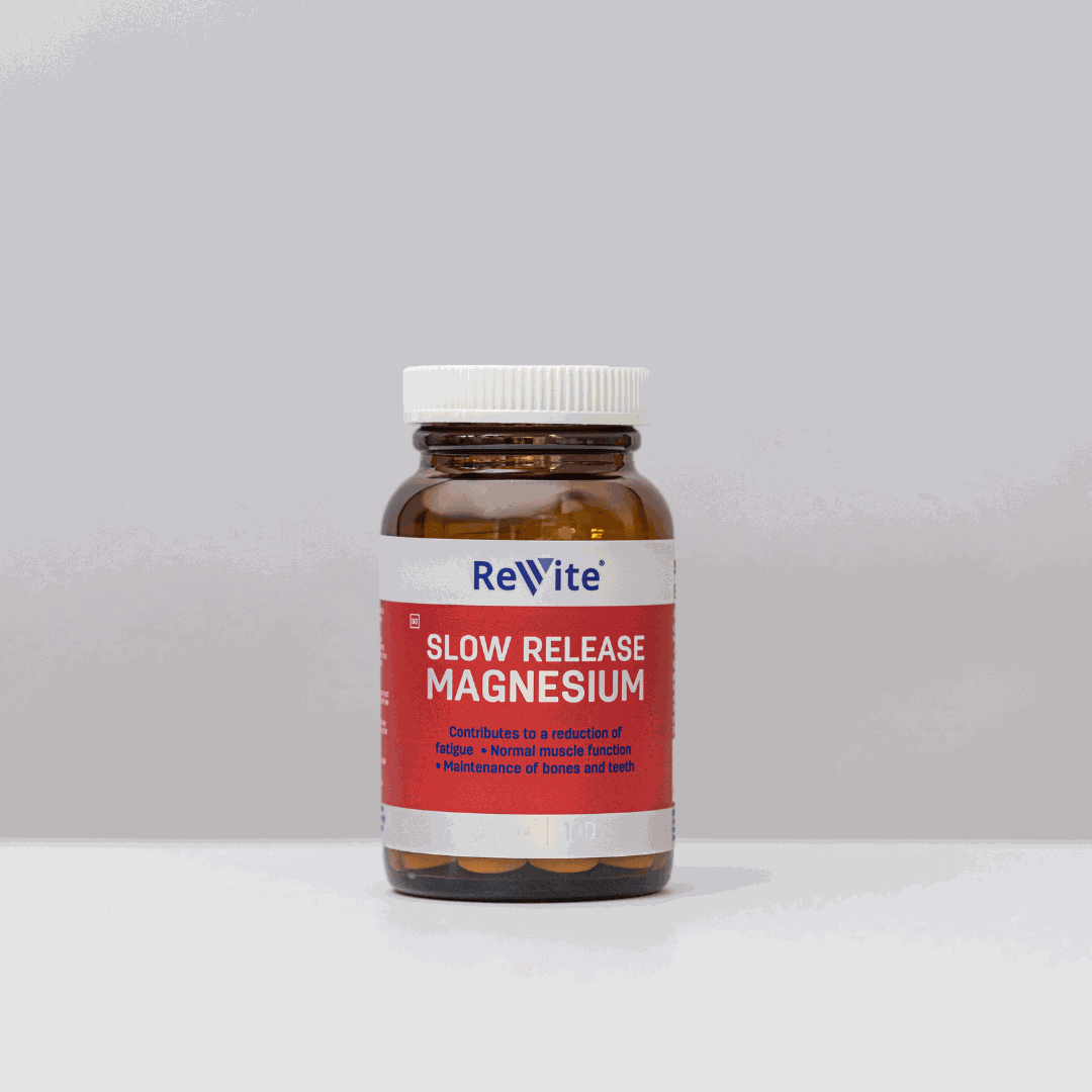 Bottle of ReVite Magnesium Slow Release Tabs supplement for reducing fatigue and supporting muscle function
