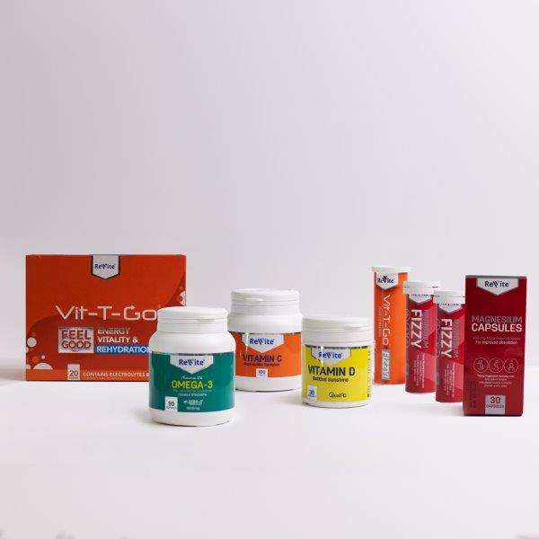 Speciality Box - Fitness vitamins and supplements including omega-3, vitamin C, vitamin D, magnesium capsules, and fizzy tablets for health and fitness support