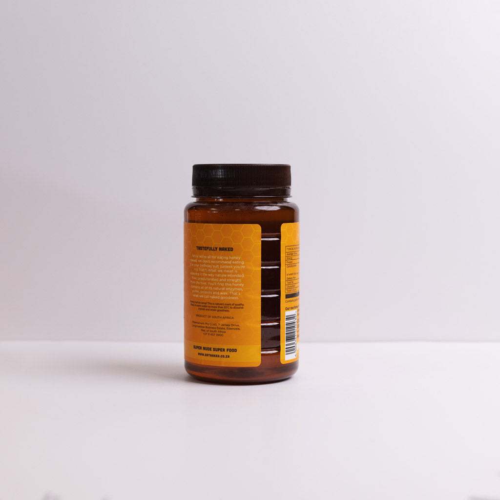 700g raw honey jar with natural enzymes, pollen, propolis, and wax in amber container