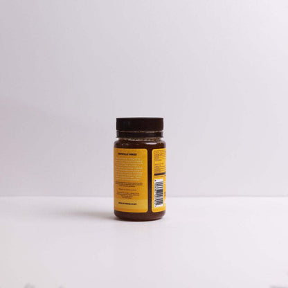 Raw Honey Jar 325g with natural enzymes, pollen, propolis, and wax in amber jar with black lid